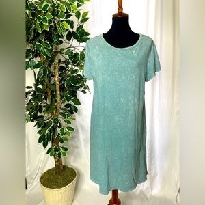 Light, sky blue dress with bleach marks throughout!